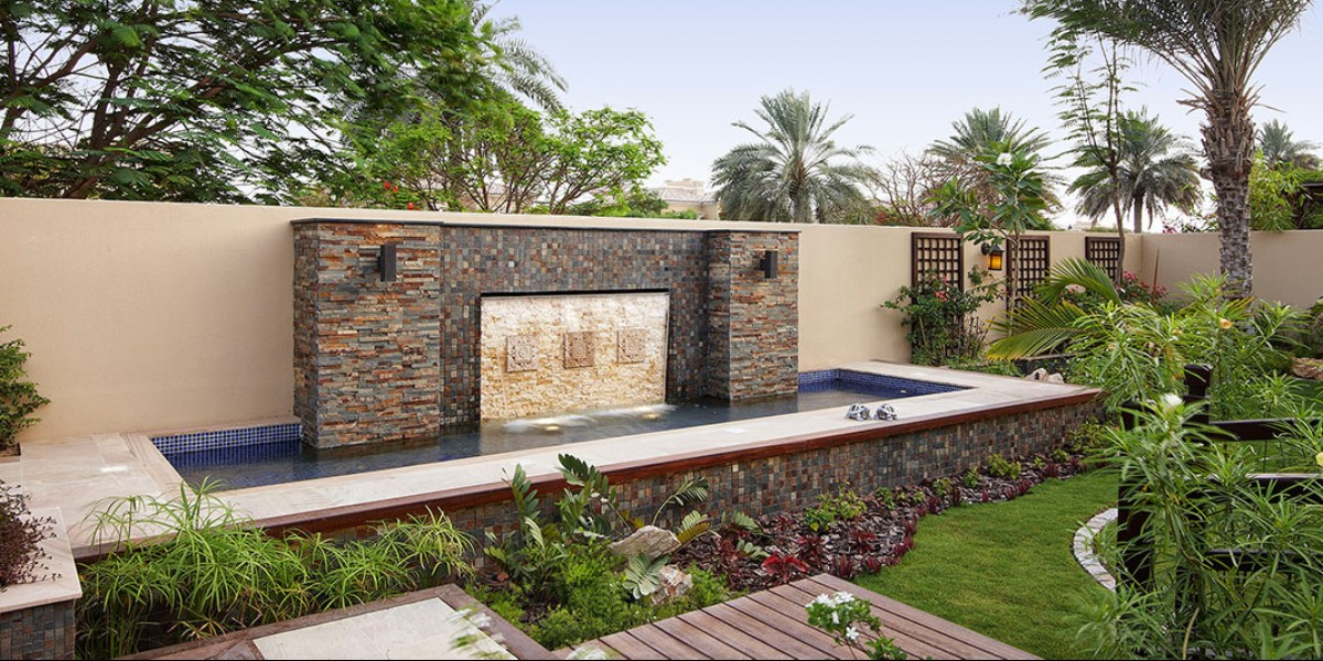 Decide what features you want to showcase in your landscape design. Water features, fire features, feature walls, and living walls all work wonders to enhance your backyard.